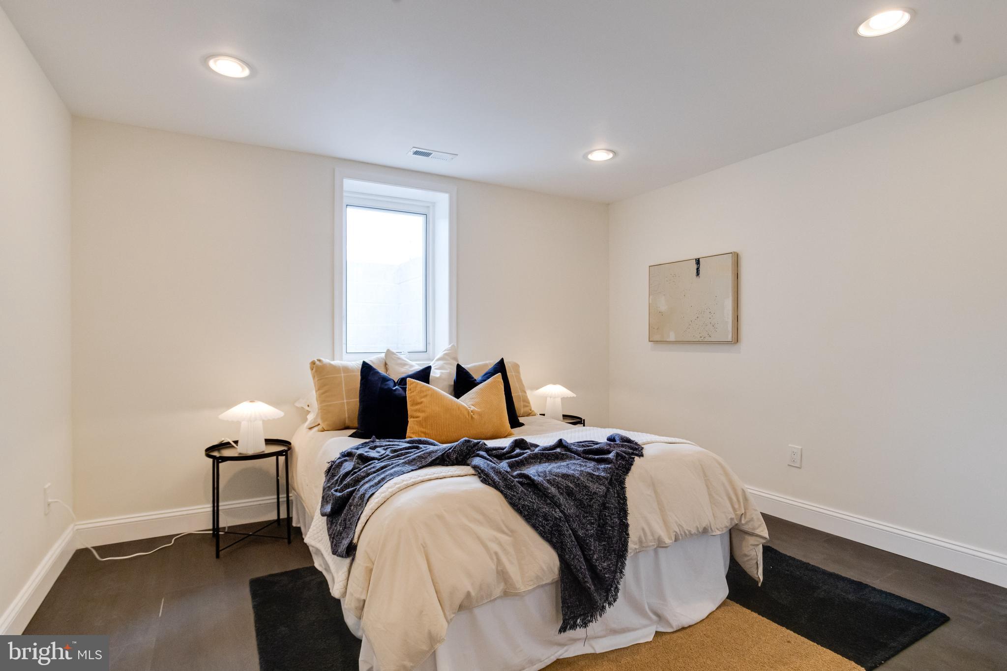 8041 Edgewater Avenue Rosedale, MD 21237 - Photo 31 of 38 a bedroom with bed and a window