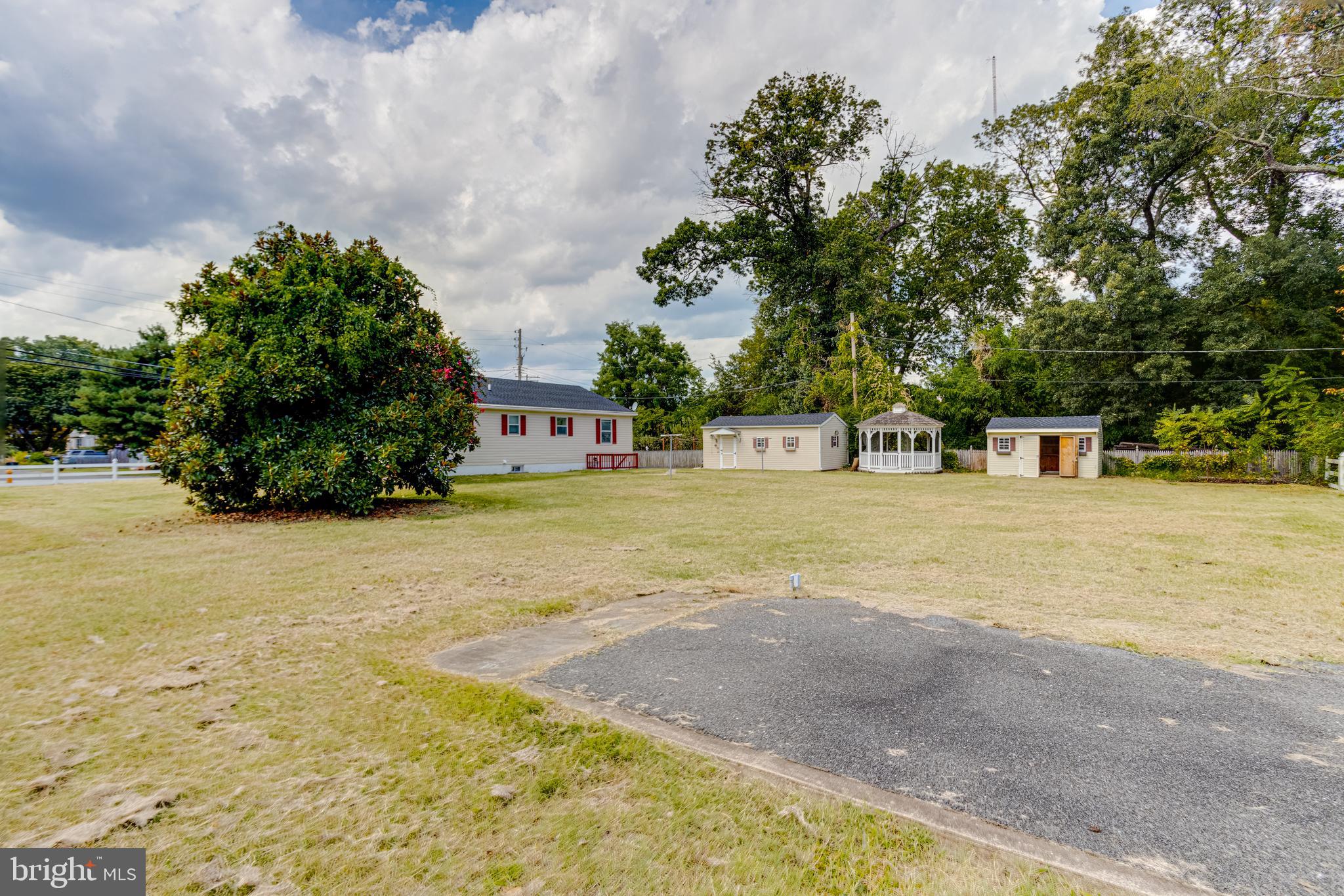 8041 Edgewater Avenue Rosedale, MD 21237 - Photo 36 of 38 a house with trees in front of it