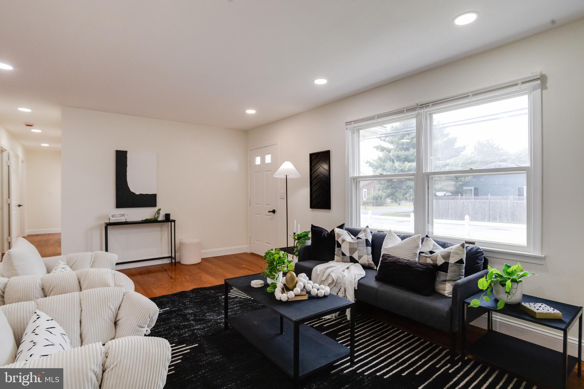 8041 Edgewater Avenue Rosedale, MD 21237 - Photo 6 of 38 a living room with furniture and a large window