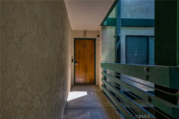 a bathroom with a shower and a sink