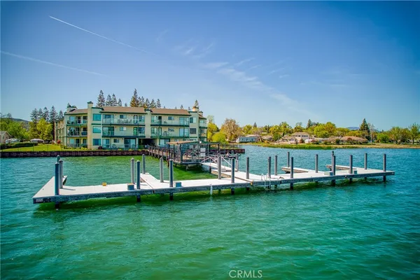 a view of a lake with a big yard