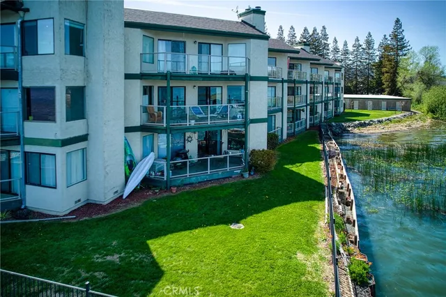 a view of an apartment with a garden