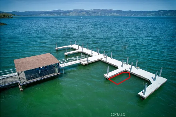 a aerial view of a house with a ocean view