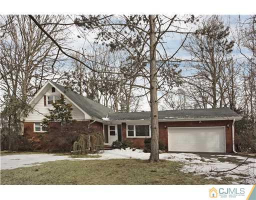 5 Roney Road Edison, NJ 08820 - Photo 1 of 25 a front view of a house with yard