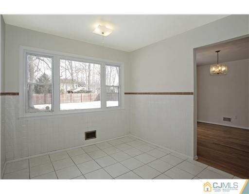 5 Roney Road Edison, NJ 08820 - Photo 16 of 25 a view of an empty room with a window
