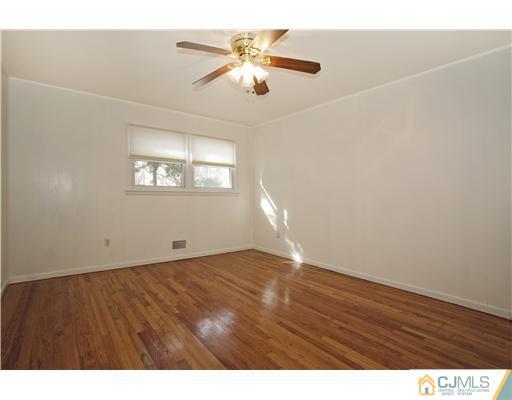 5 Roney Road Edison, NJ 08820 - Photo 18 of 25 a view of an empty room with a window