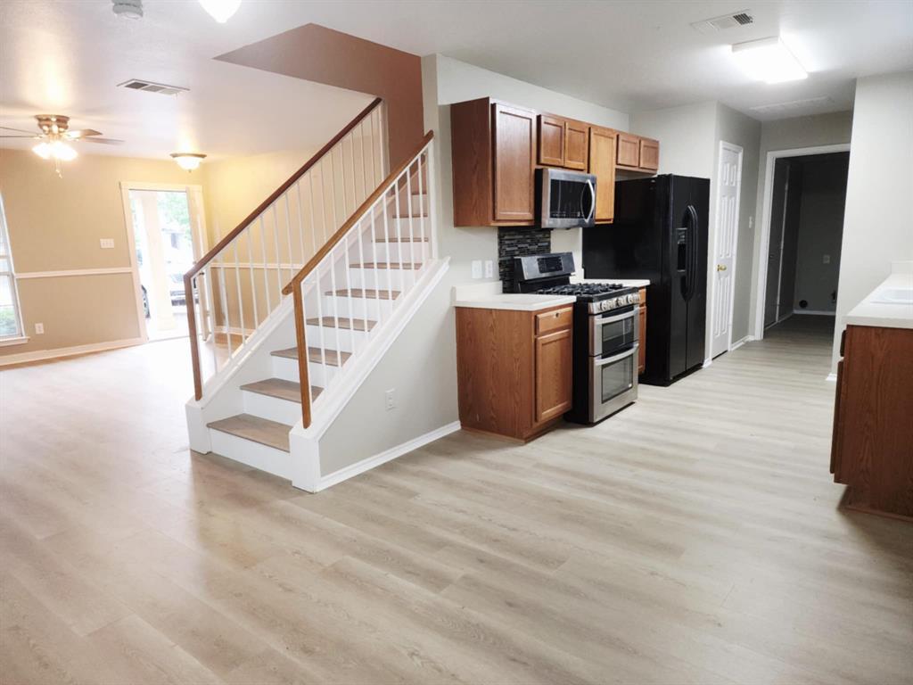 2700 Breezy Point Cove Round Rock, TX 78665 - Photo 26 of 26 a view of kitchen with sink microwave and refrigerator