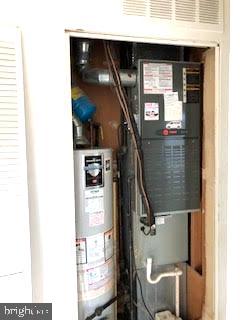 321 Highfalcon Road Reisterstown, MD 21136 - Photo 14 of 19 WATER HEATER AND HEAT PUMP