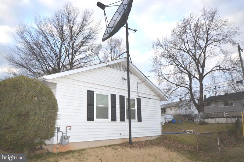 321 Highfalcon Road Reisterstown, MD 21136 - Photo 19 of 19 RIGHT AND GAS METER AND SATELLITE DISH
