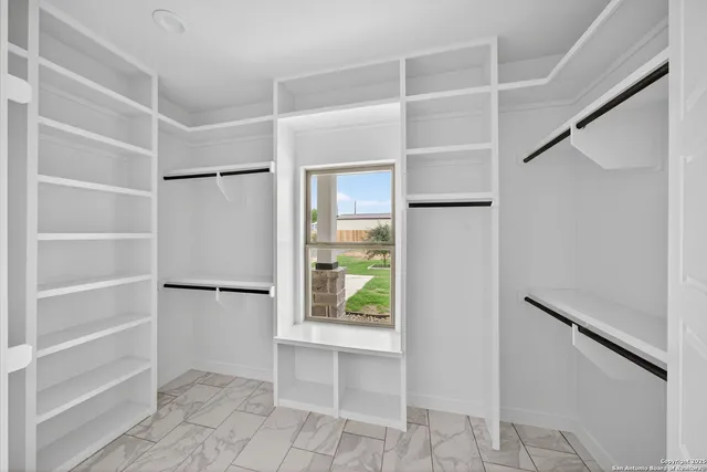 a view of an empty walk in closet