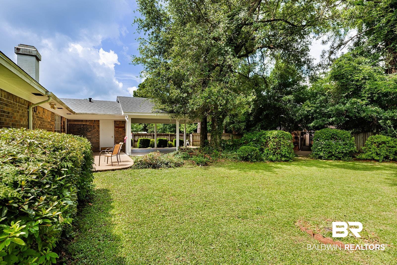 2920 Quail Creek Run Mobile, AL 36695 - Photo 29 of 33 View of yard featuring a patio area