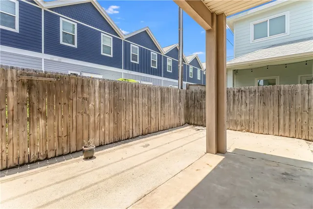 a view of a brick house with a street view