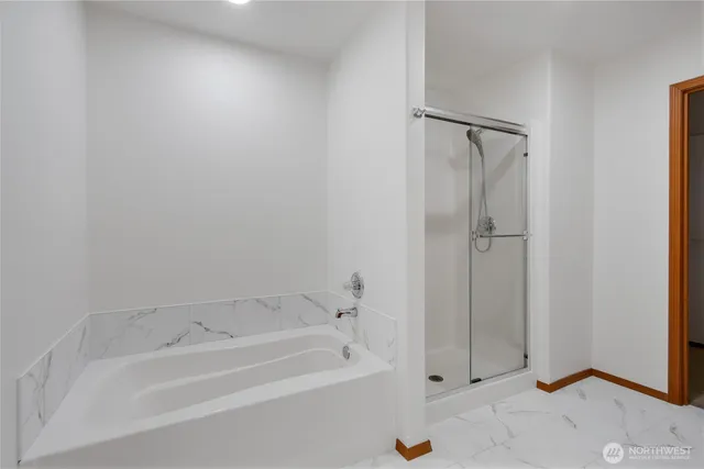 a bathroom with a sink vanity and a mirror