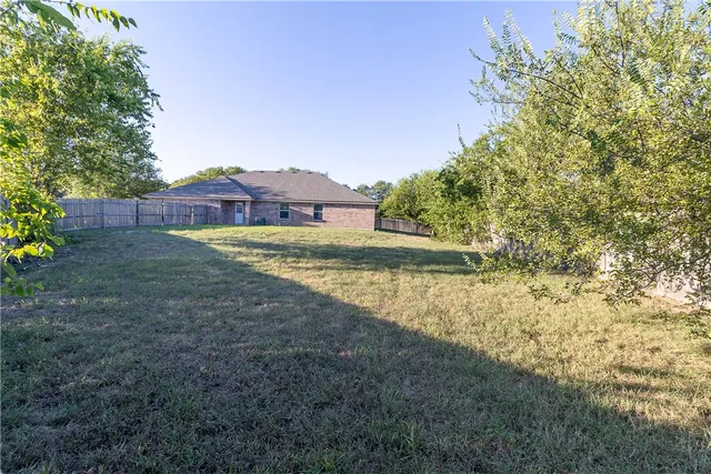 a house view with a garden space