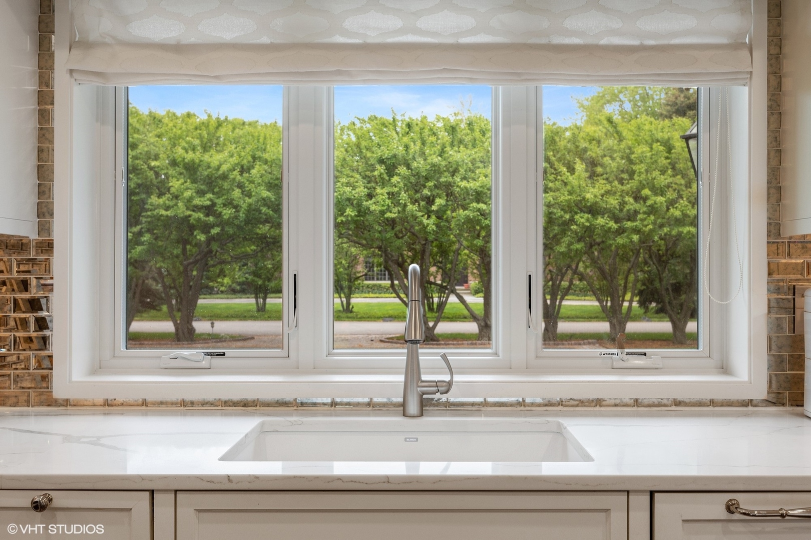 17 Meadowview Road Northfield, IL 60093 - Photo 14 of 50 a white cabinet and a mirror