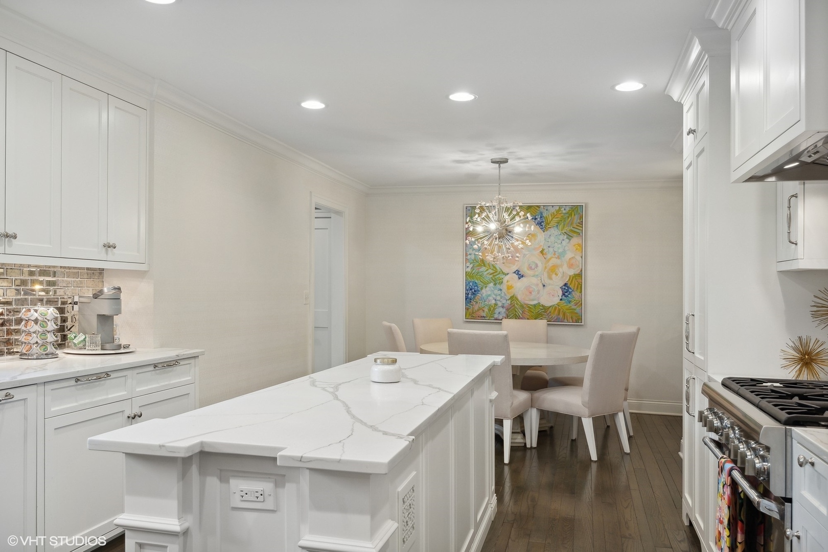 17 Meadowview Road Northfield, IL 60093 - Photo 16 of 50 a kitchen with a sink a table and chairs in it