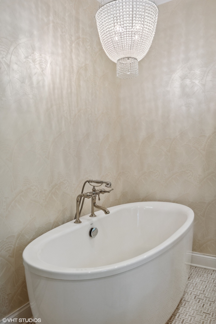 17 Meadowview Road Northfield, IL 60093 - Photo 30 of 50 a white bath tub sitting next to a white sink