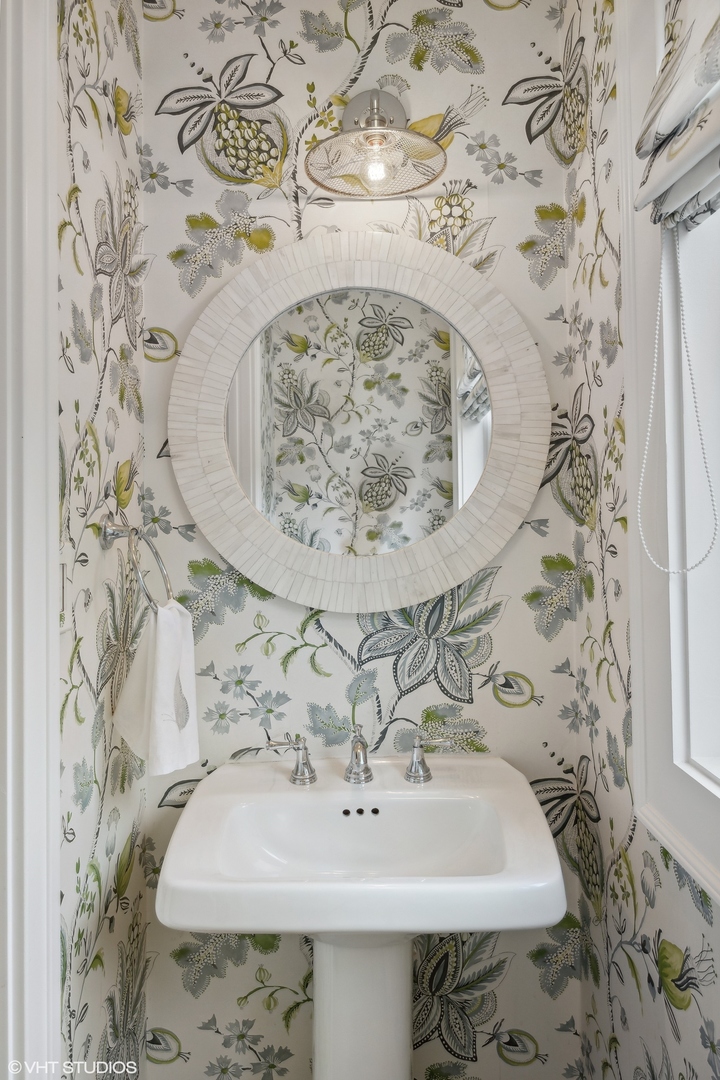 17 Meadowview Road Northfield, IL 60093 - Photo 37 of 50 a bathroom with a sink and a mirror