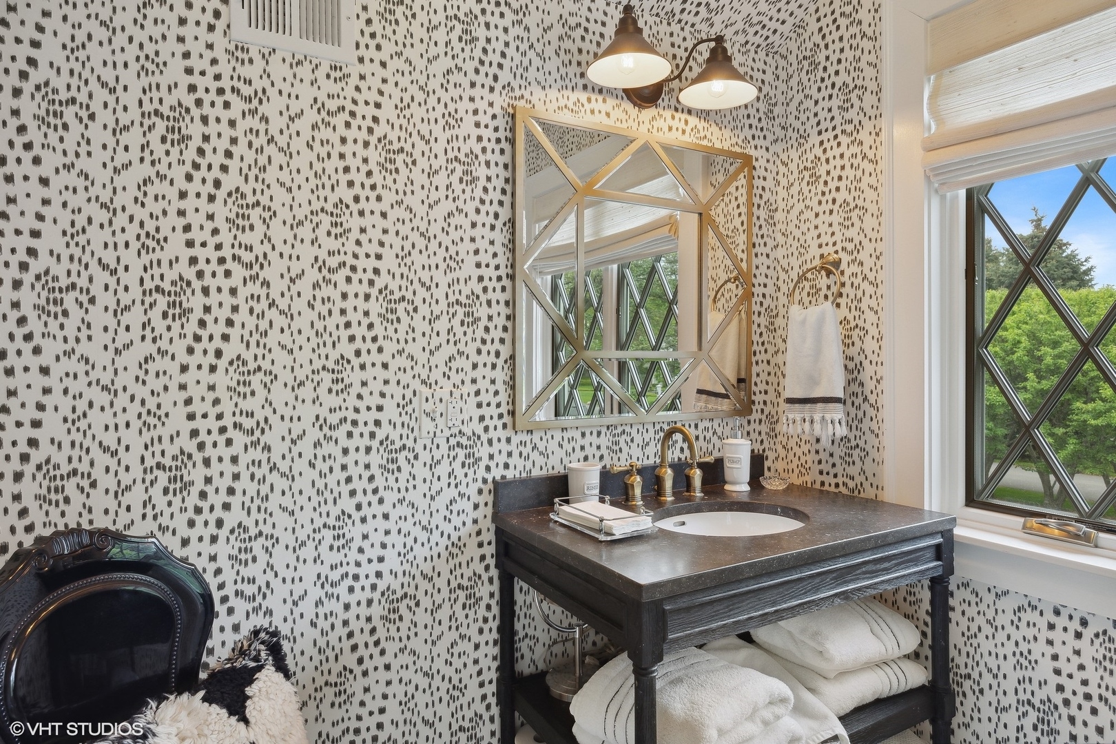 17 Meadowview Road Northfield, IL 60093 - Photo 41 of 50 a bathroom with a sink a mirror and a shower