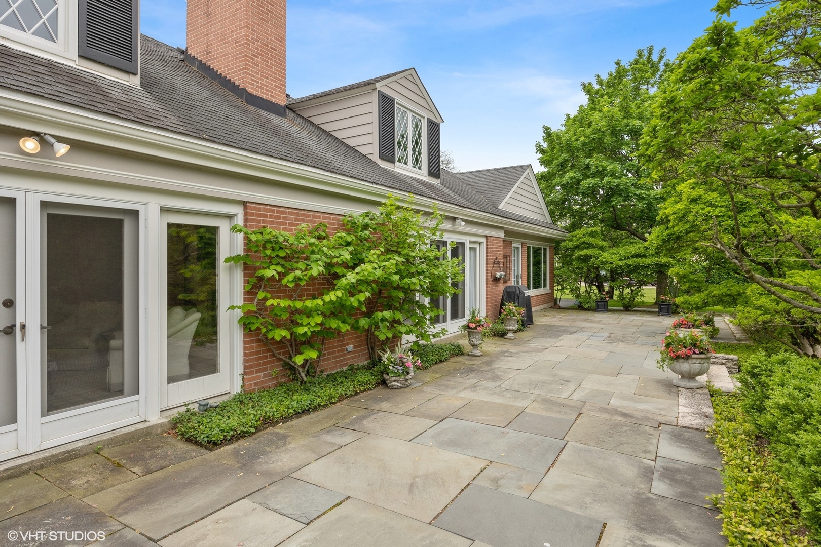 17 Meadowview Road Northfield, IL 60093 - Photo 46 of 50 a view of a house with backyard and sitting area