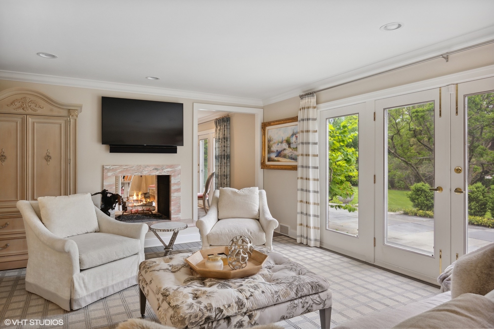 17 Meadowview Road Northfield, IL 60093 - Photo 9 of 50 a living room with furniture a fireplace and a flat screen tv