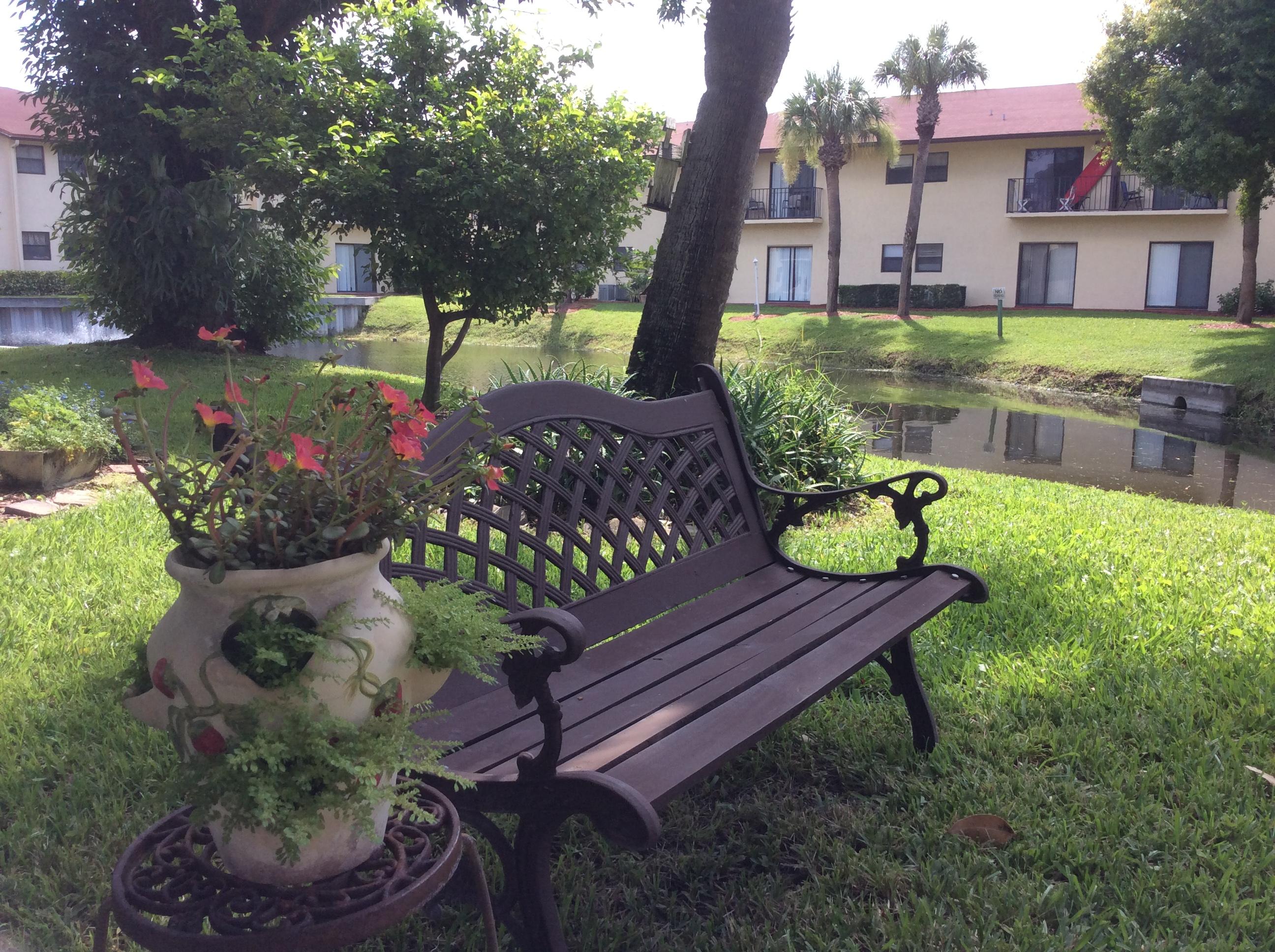 Island House Bench by Pond
