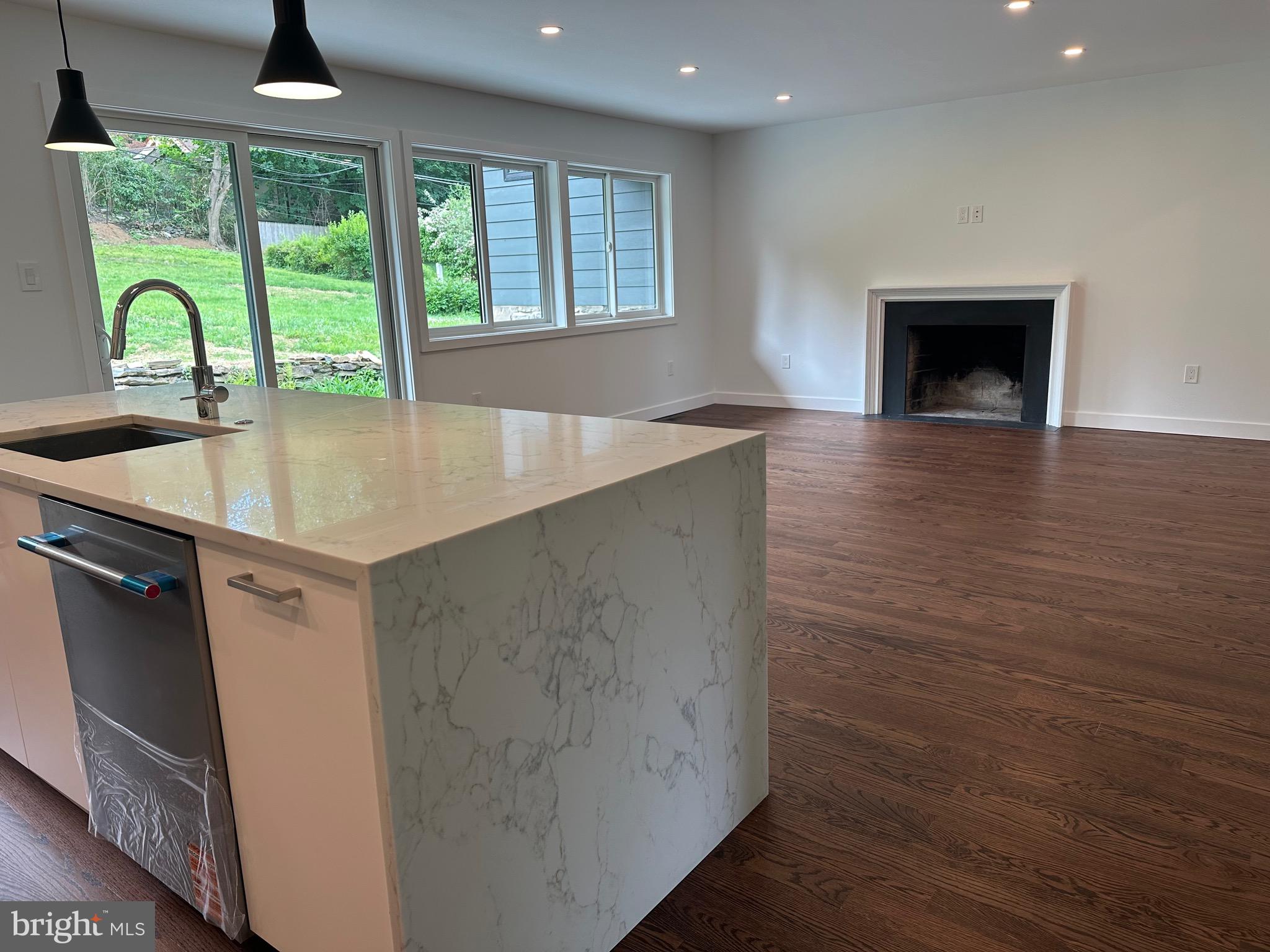 713 Woodfield Road Villanova, PA 19085 - Photo 8 of 36 wooden floor in an empty room with a window