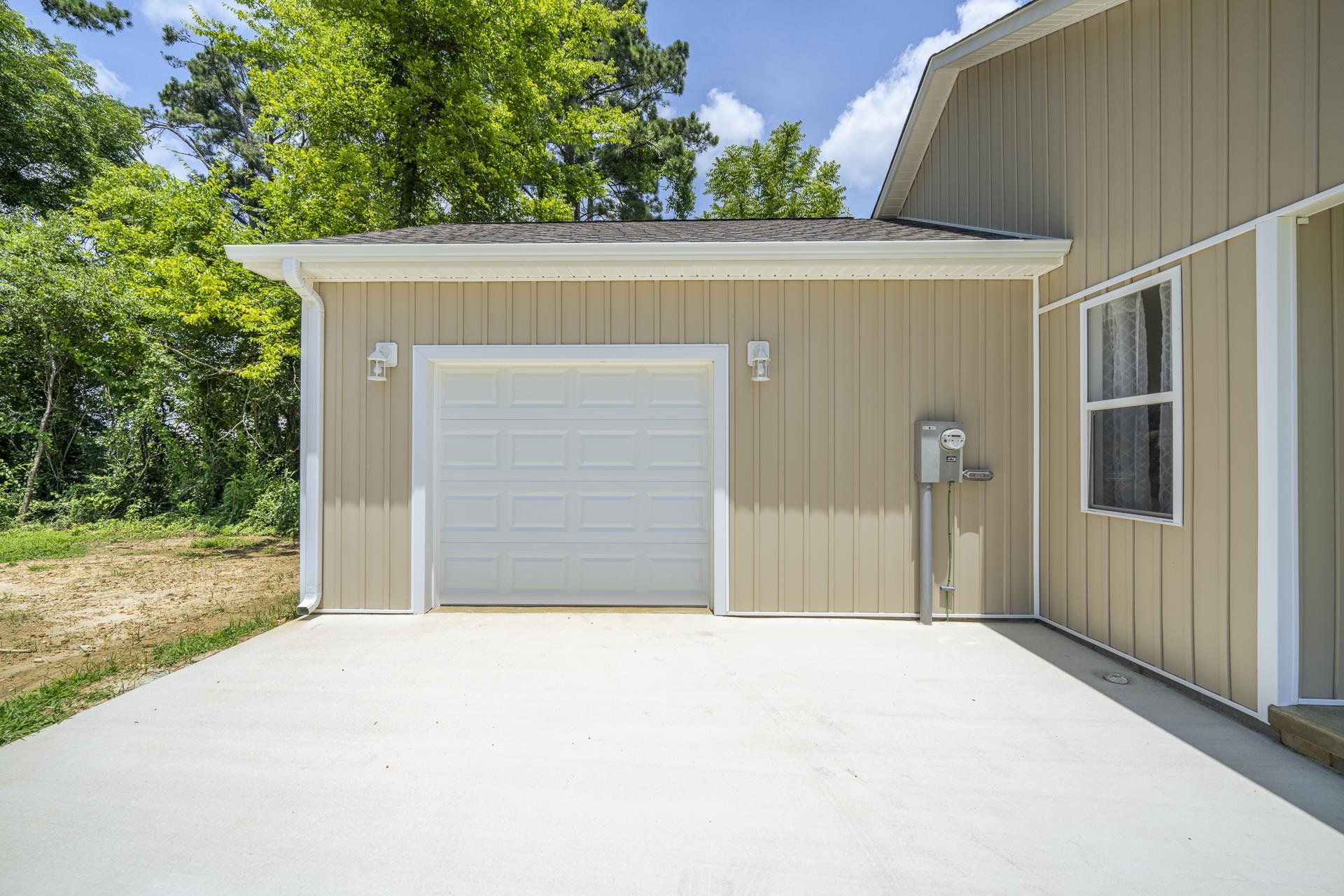 231 Clausel Lane Adamsville, TN 38310 - Photo 24 of 32 a house with trees in front of it