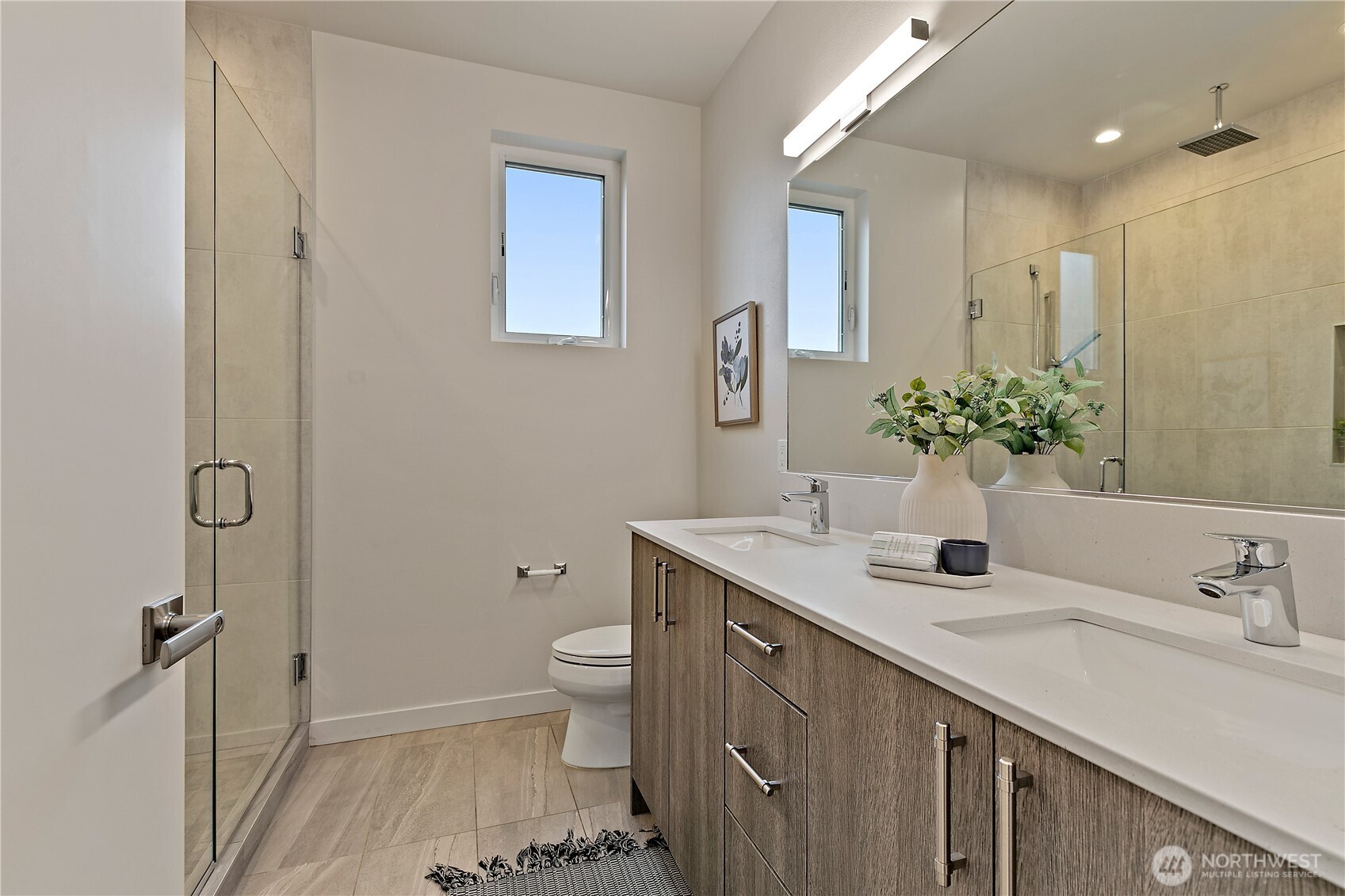 4100 37th Avenue South Seattle, WA 98118 - Photo 16 of 19 a bathroom with a sink toilet and shower