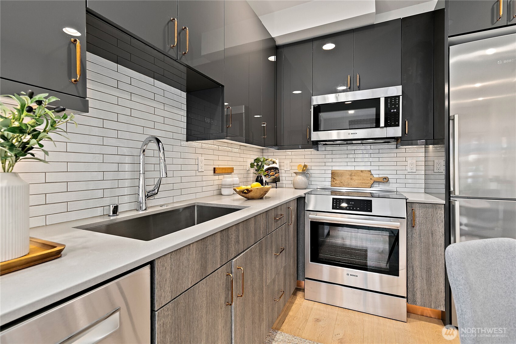 4100 37th Avenue South Seattle, WA 98118 - Photo 10 of 19 a kitchen with a sink and cabinets