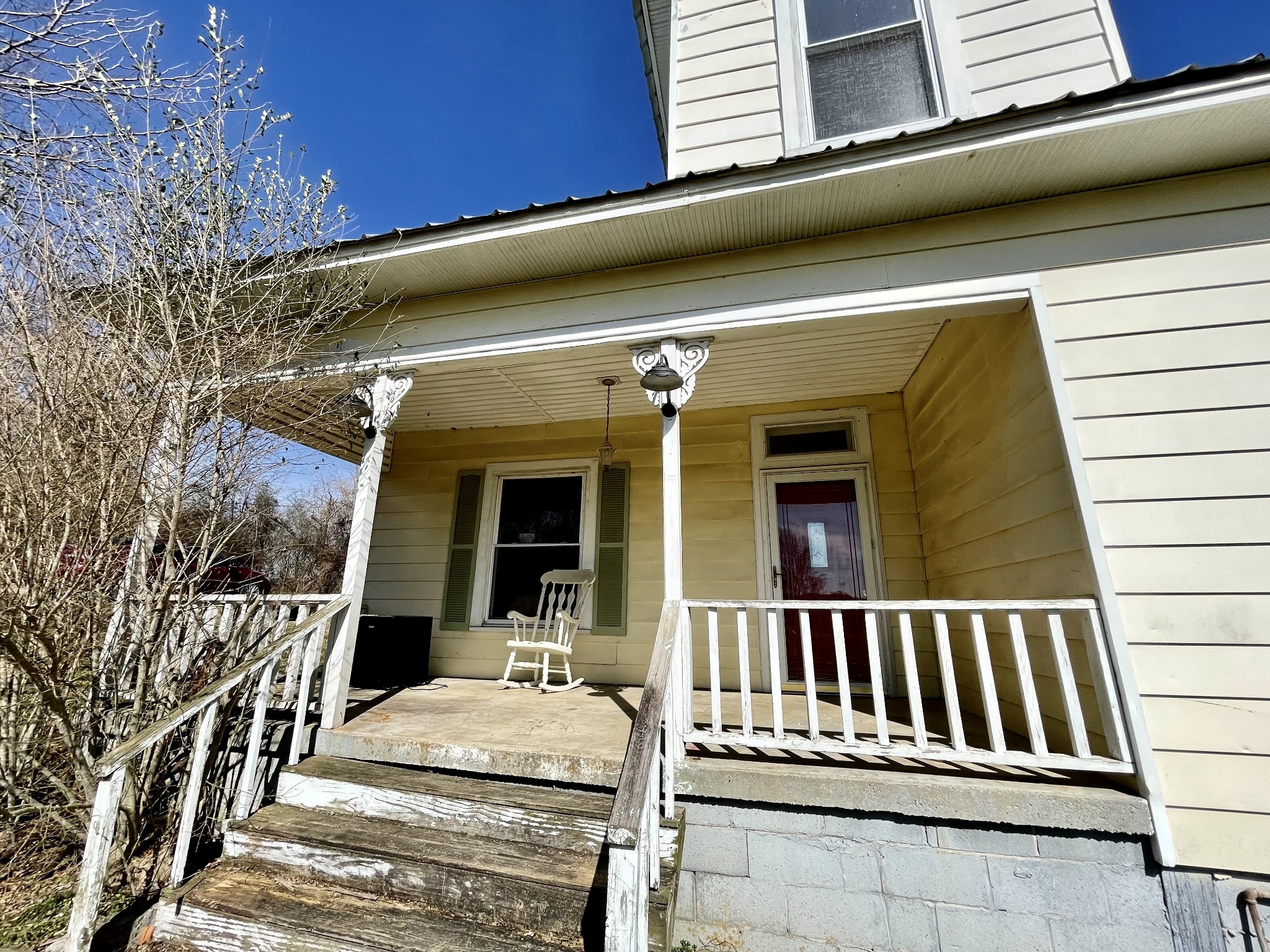 313 Smith Road Cornersville, TN 37047 - Photo 11 of 27 a view of a house with a deck