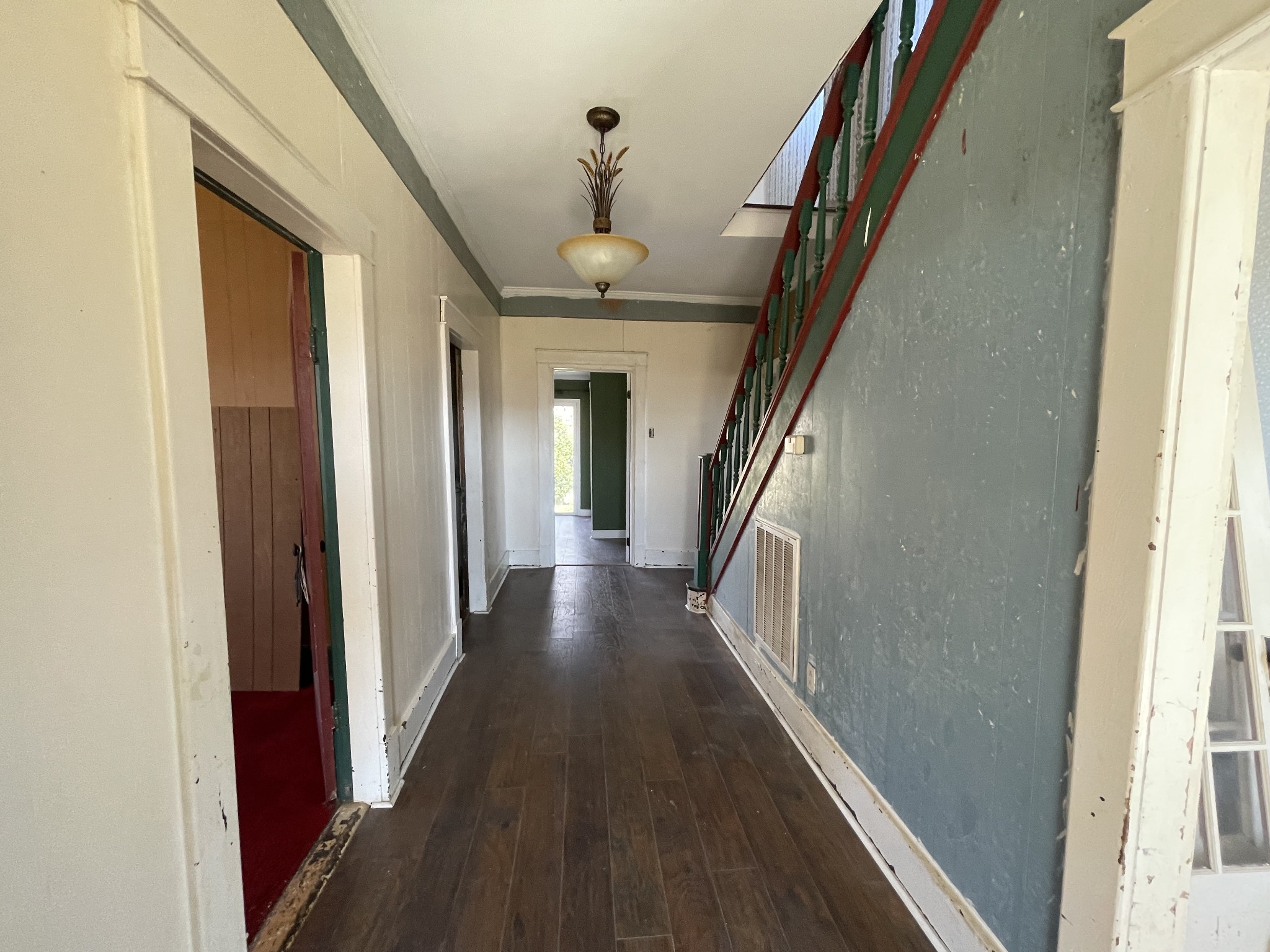 313 Smith Road Cornersville, TN 37047 - Photo 12 of 27 a view of a hallway with wooden floor and staircase