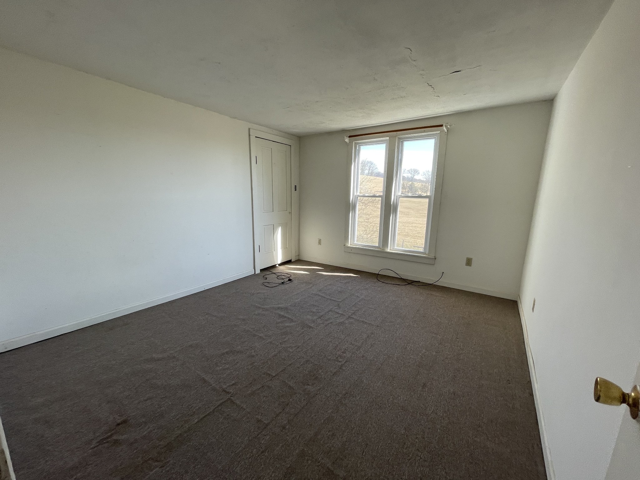 313 Smith Road Cornersville, TN 37047 - Photo 23 of 27 an empty room with a window