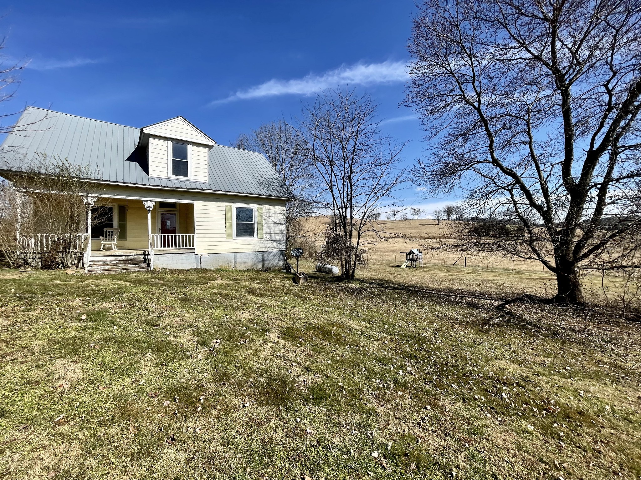 313 Smith Road Cornersville, TN 37047 - Photo 3 of 27 a front view of a house with a yard