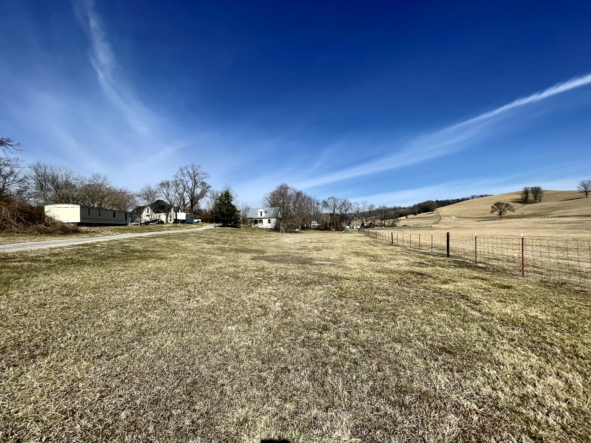 313 Smith Road Cornersville, TN 37047 - Photo 4 of 27 a view of an ocean with a building in the background