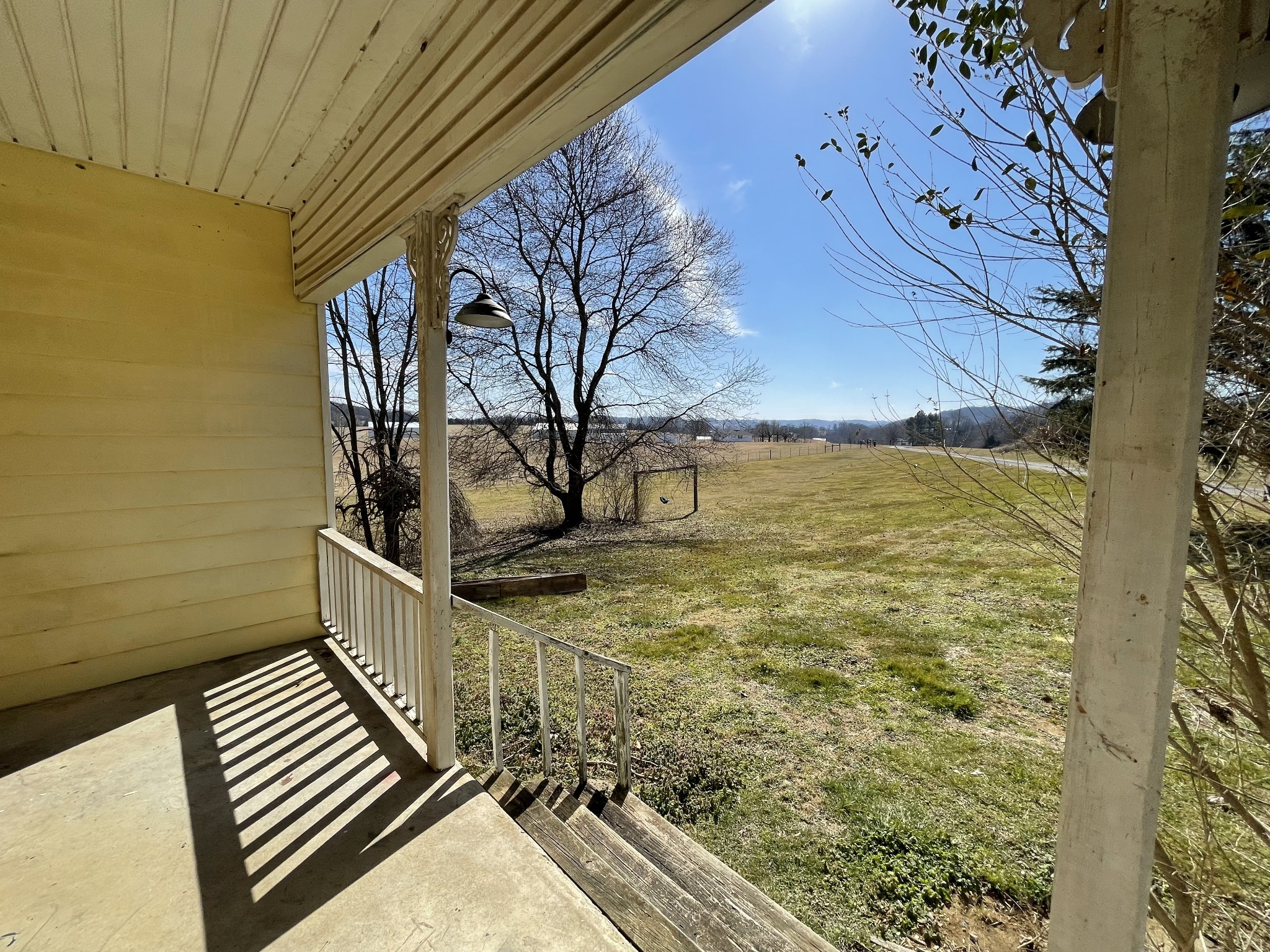 313 Smith Road Cornersville, TN 37047 - Photo 5 of 27 a view of balcony with wooden floor