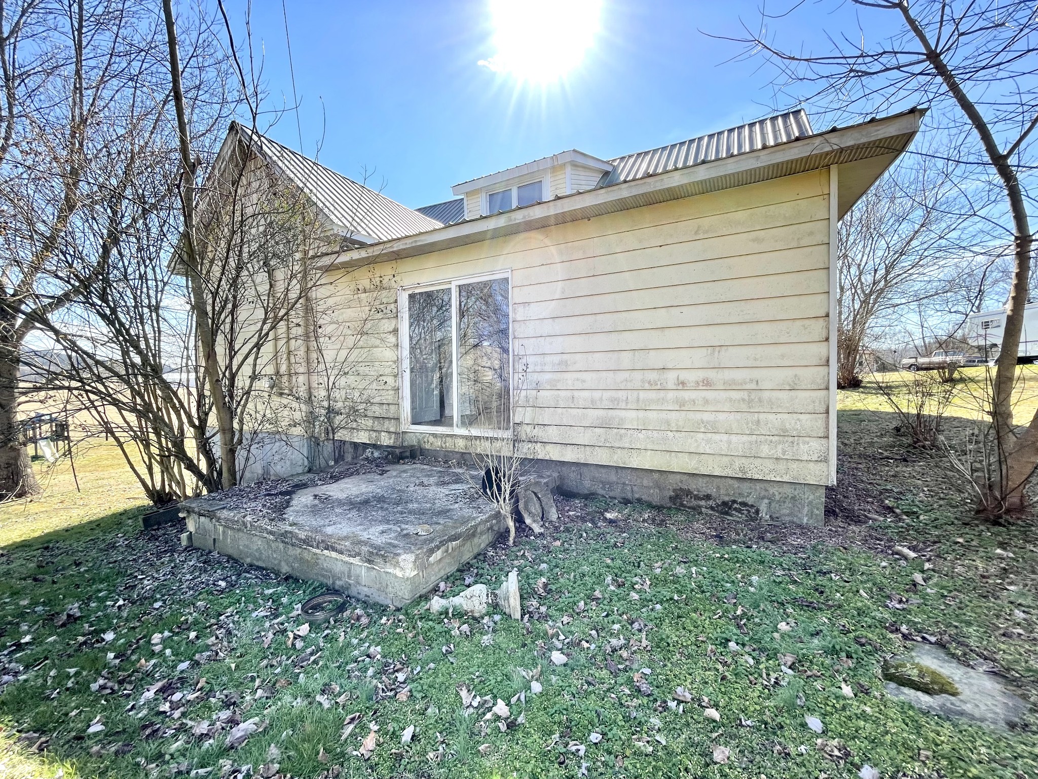313 Smith Road Cornersville, TN 37047 - Photo 8 of 27 a view of a house with a yard