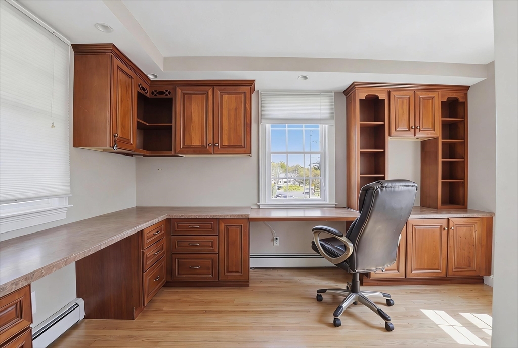 183 Whiting Street Hanover, MA 02339 - Photo 34 of 42 a view of a workspace with furniture and a window