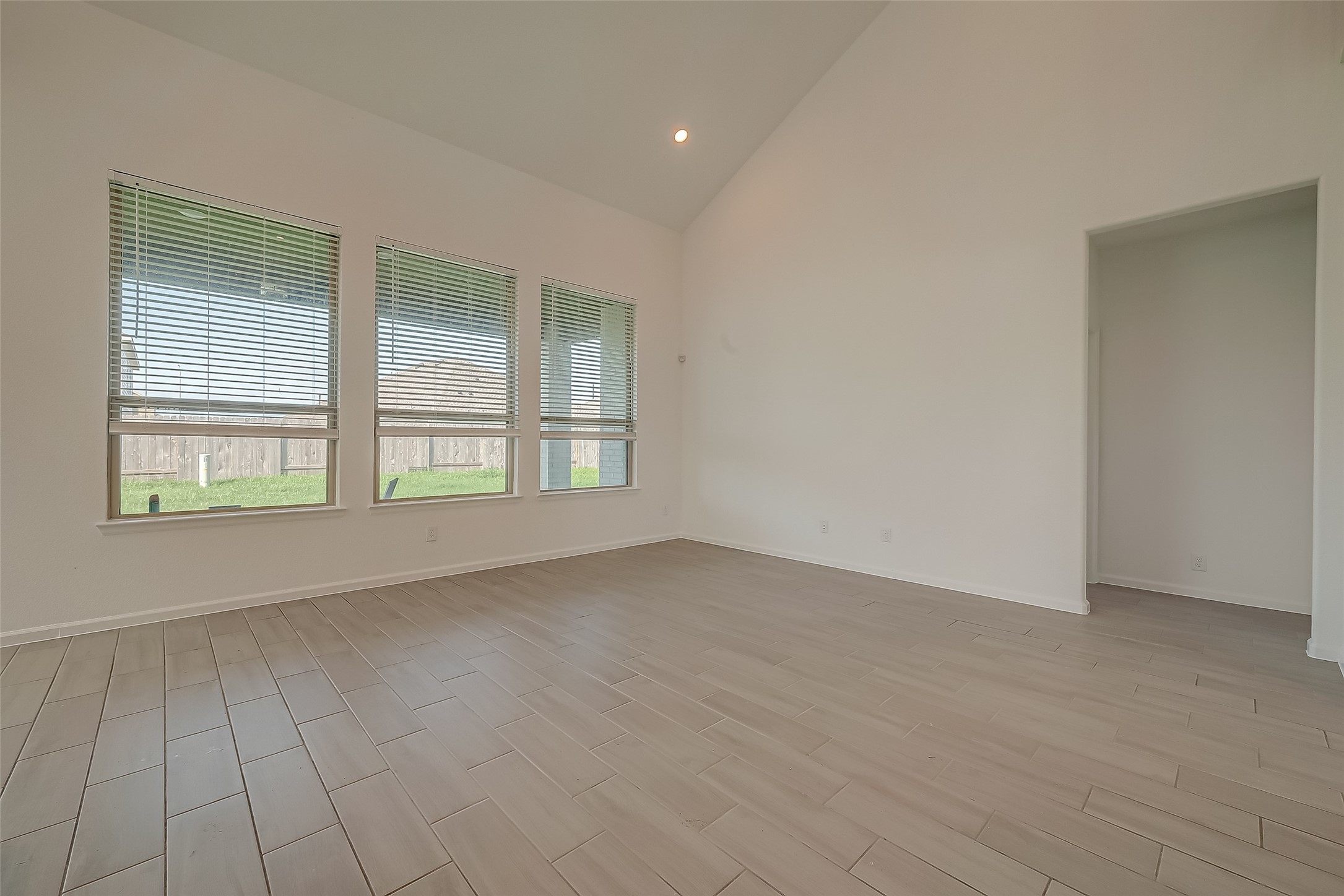5010 Slate Prt Court Rosenberg, TX 77469 - Photo 11 of 39 an empty room with windows