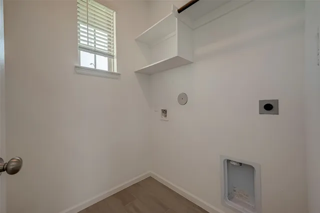 a large kitchen with granite countertop a sink and dishwasher stove top oven