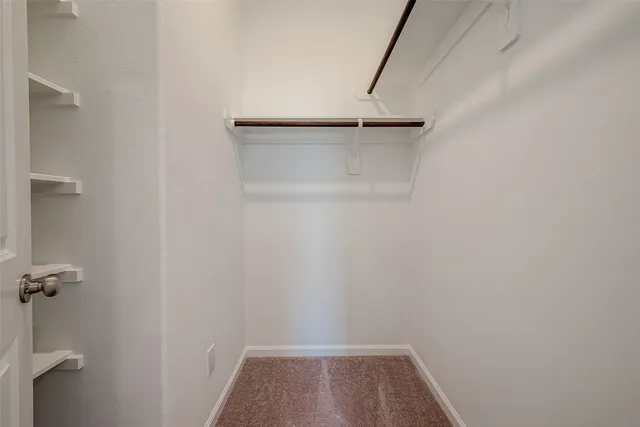 a view of small space with racks on the wall