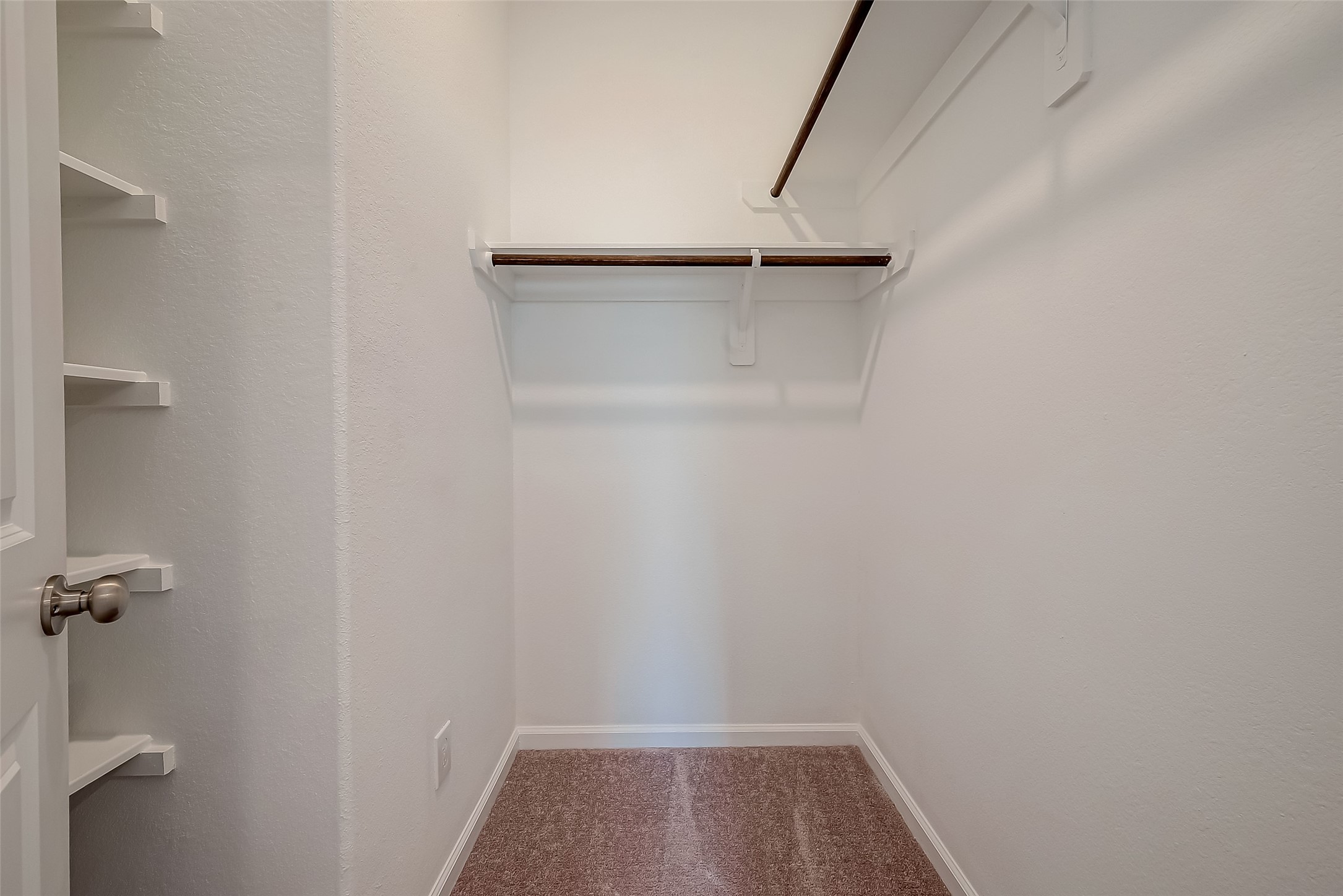 5010 Slate Prt Court Rosenberg, TX 77469 - Photo 35 of 39 a view of small space with racks on the wall