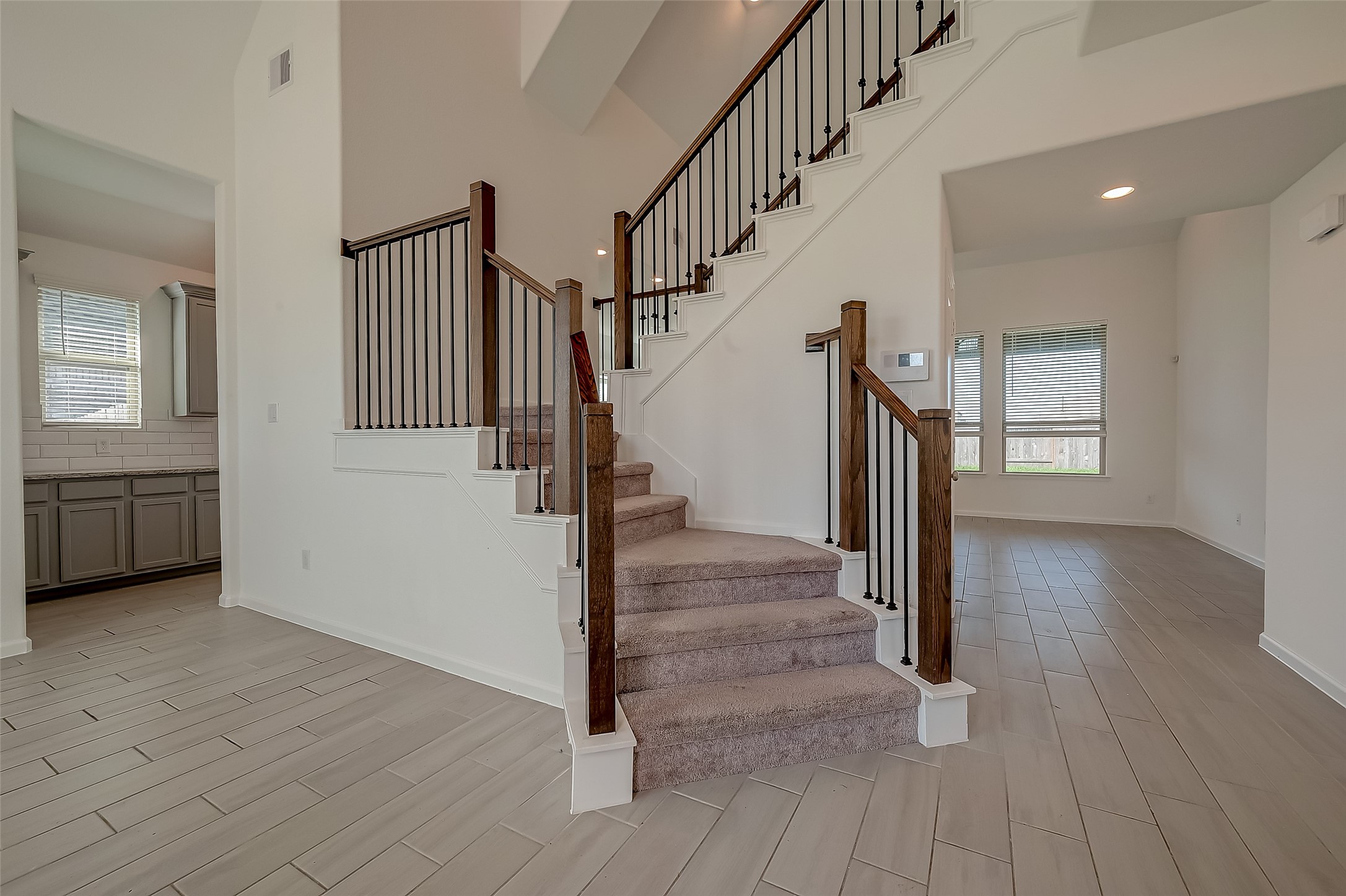 5010 Slate Prt Court Rosenberg, TX 77469 - Photo 5 of 39 a view of entryway and hall with wooden floor