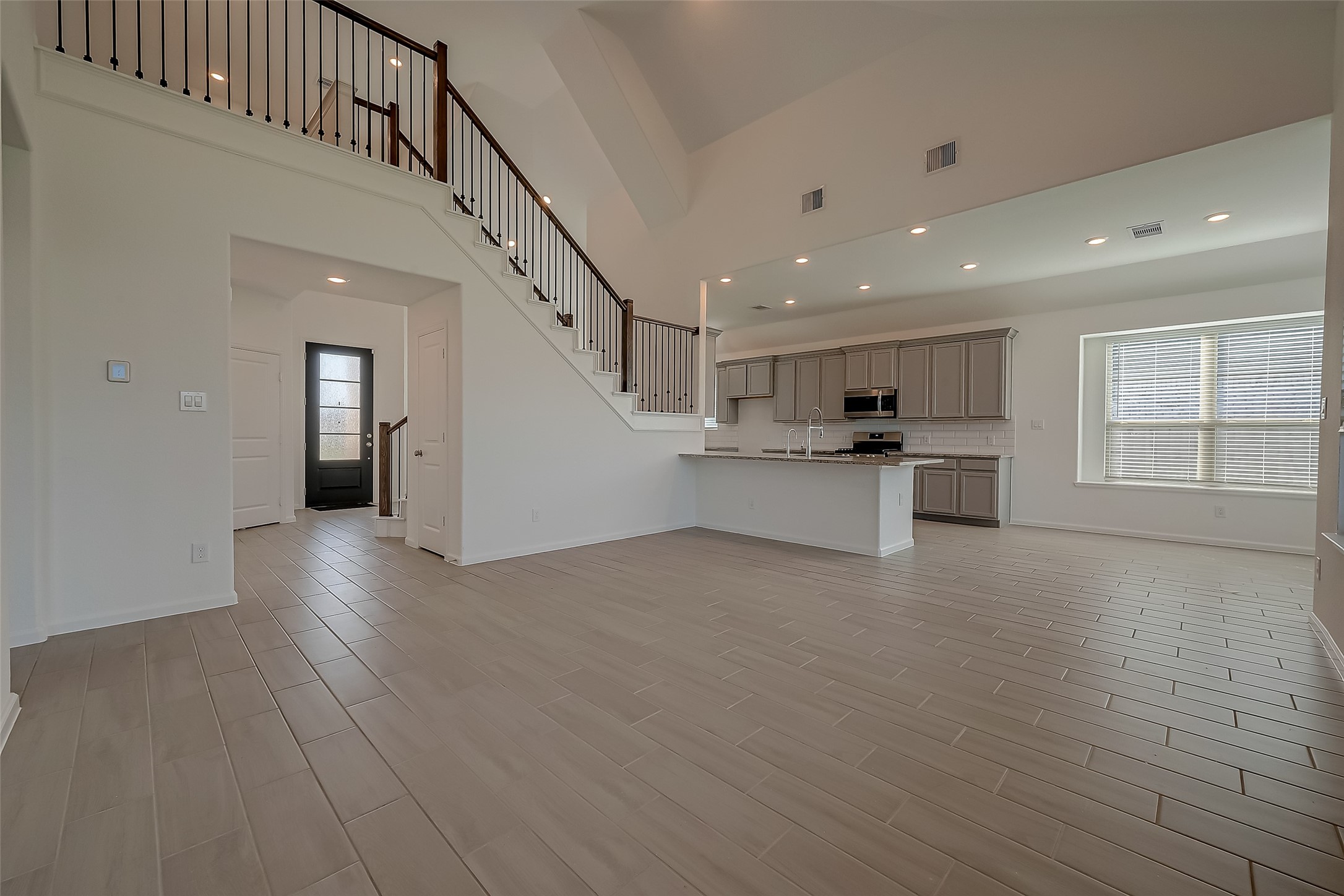 5010 Slate Prt Court Rosenberg, TX 77469 - Photo 8 of 39 a view of a kitchen with a sink and a window