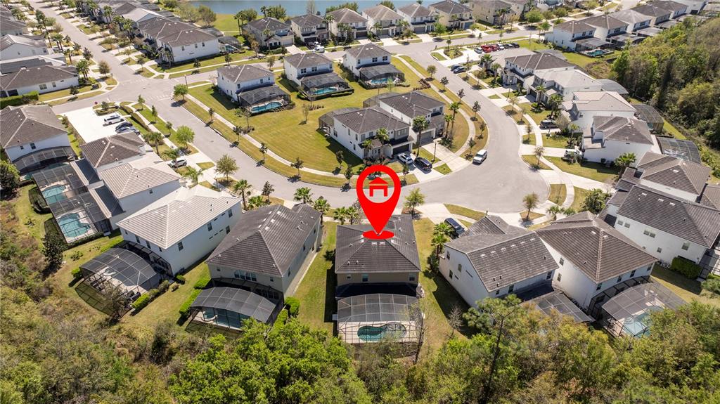 4561 Cabello Loop Kissimmee, FL 34746 - Photo 13 of 100 an aerial view of residential house with outdoor space and parking