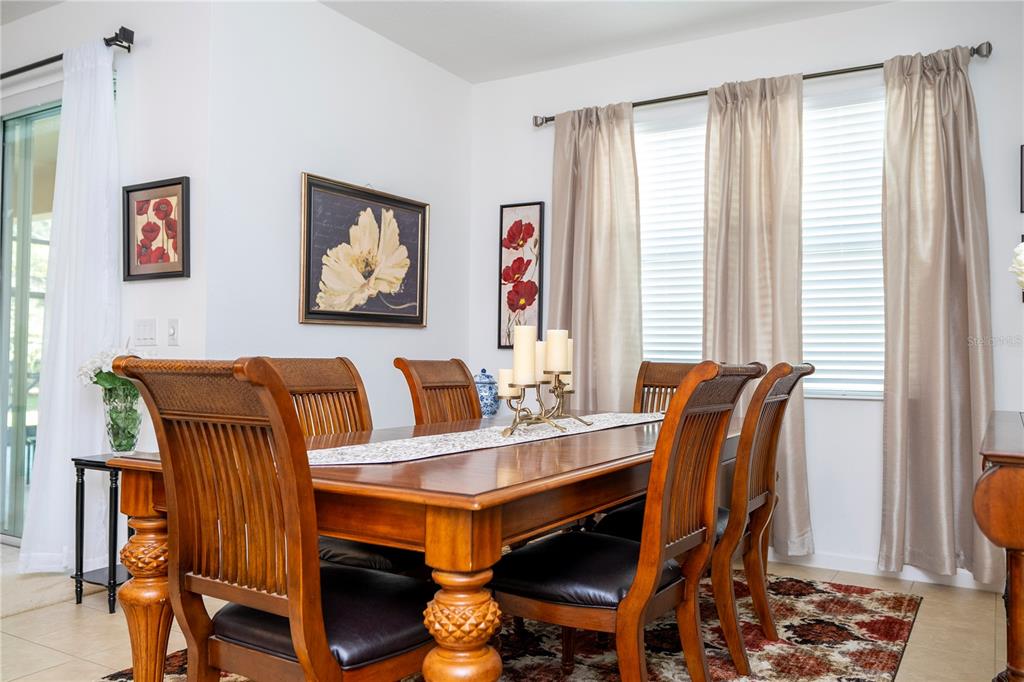 4561 Cabello Loop Kissimmee, FL 34746 - Photo 38 of 100 a view of a dining room with furniture and window