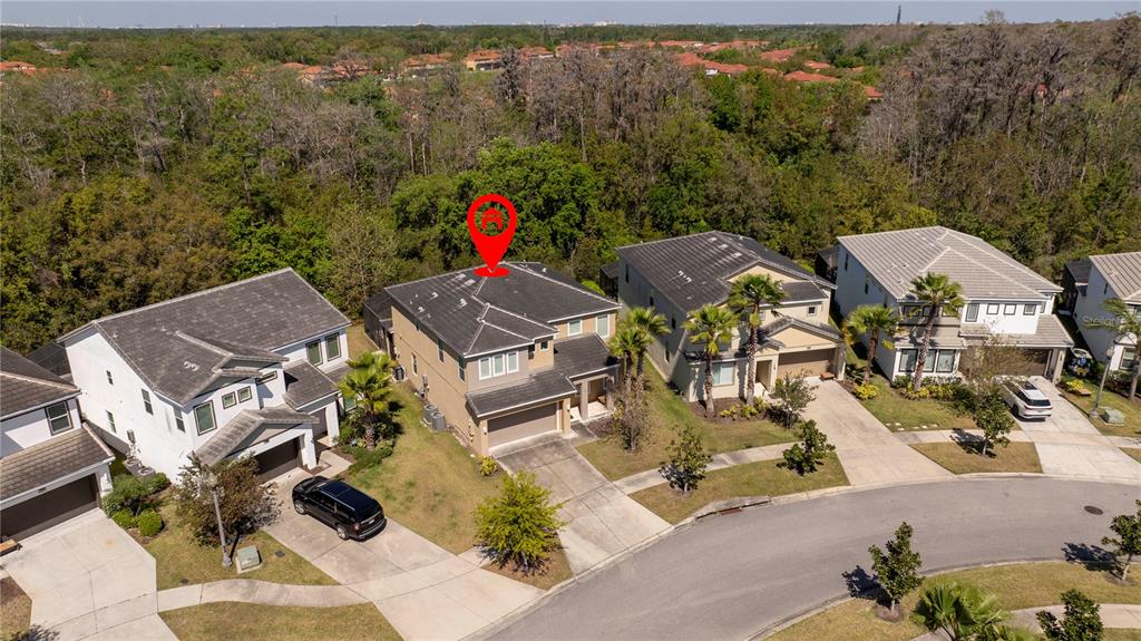 4561 Cabello Loop Kissimmee, FL 34746 - Photo 4 of 100 an aerial view of a house with swimming pool and mountain view