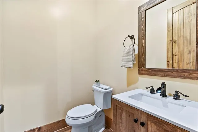 a view of a livingroom with furniture and windows