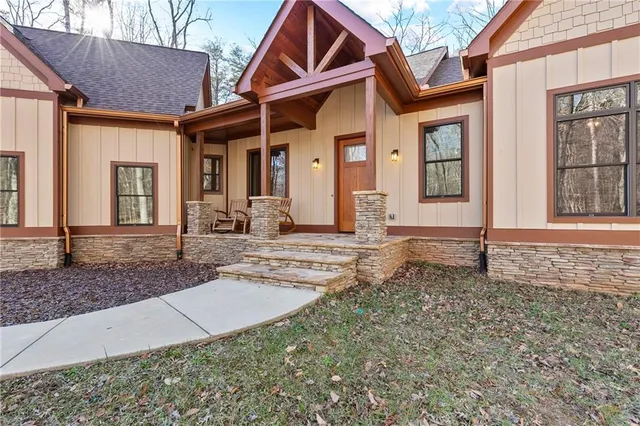 a front view of a house with garden