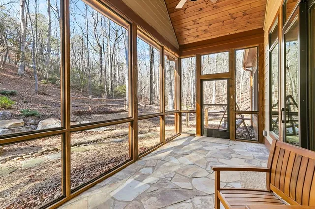 a backyard of a house with barbeque oven